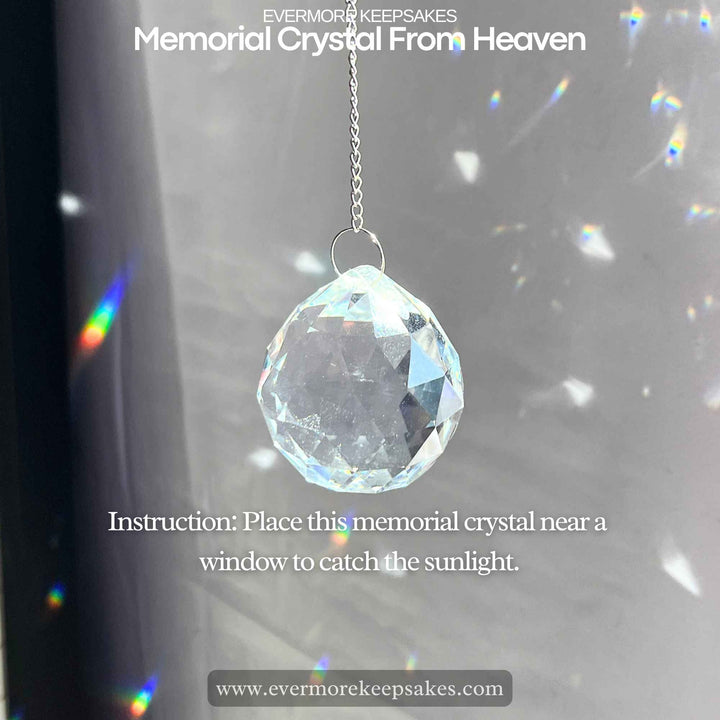 Memorial crystal from heaven rainbow sun catcher, beautiful memorial crystal ornament reflecting rainbow colors, comforting keepsake for those grieving, memorial sun catcher crystal hanging in sunlight, remembrance gift to honor a loved one, memorial crystal catching sunlight and creating rainbows, perfect sympathy gift for grieving hearts, rainbow sun catcher memorial crystal symbolizing eternal love, hanging memorial crystal for remembering a loved one, thoughtful Christmas memorial gift, memorial crystal